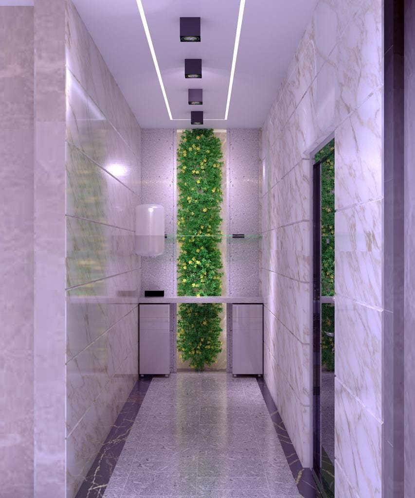 Corridor with green living wall feature — interior design by 3A Design Solutions